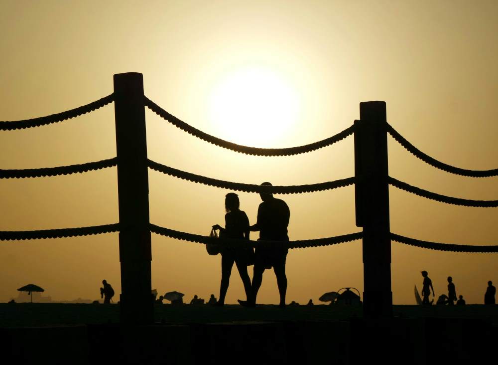 Couple walking on the beach
