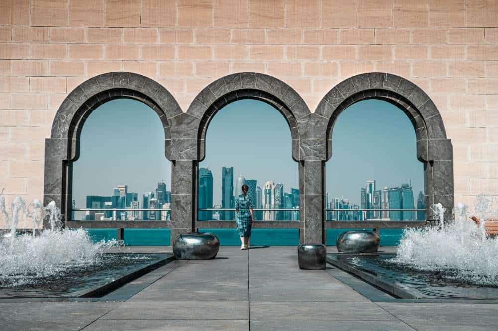 Brown Building in Doha With Stonewall And Arches